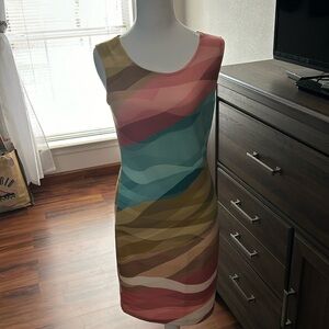 Perfect summer dress.  slim fit and stretchy with a side zipper